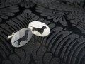 A Pair of Silver Dachshund Cufflinks by Hannah Louise Lamb